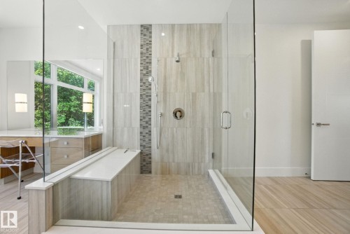 Bathroom with a shower stall, recessed lighting, and tile patterned flooring - 11823 Saskatchewan Drive, Edmonton, AB - Indoor