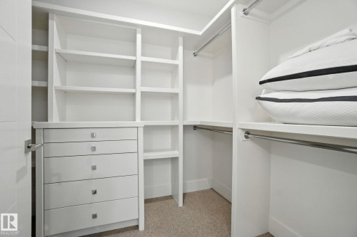 View of spacious closet - 11823 Saskatchewan Drive, Edmonton, AB - Indoor With Storage