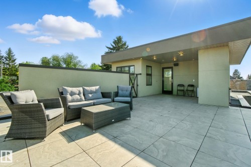 View of roof top patio with outdoor lounge area - 11823 Saskatchewan Drive, Edmonton, AB - Outdoor With Deck Patio Veranda With Exterior