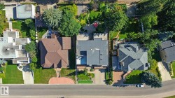 Aerial view of property and surrounding area with nearby suburban area - 