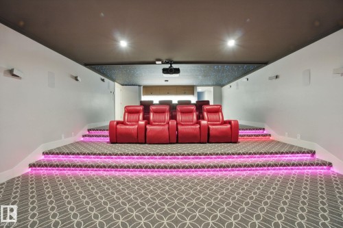 Carpeted home theater with recessed lighting and ornamental molding - 11823 Saskatchewan Drive, Edmonton, AB - Indoor Photo Showing Bedroom