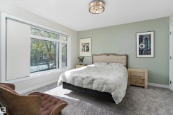 Bedroom featuring carpet and baseboards - 