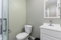 Bathroom featuring vanity and toilet - 