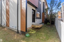 View of property exterior with stucco siding - 