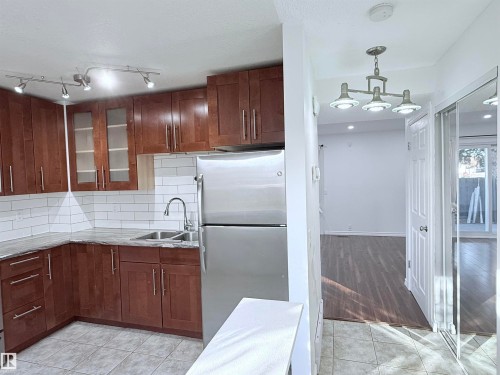 3171 138 Avenue, Edmonton, AB - Indoor Photo Showing Kitchen With Double Sink
