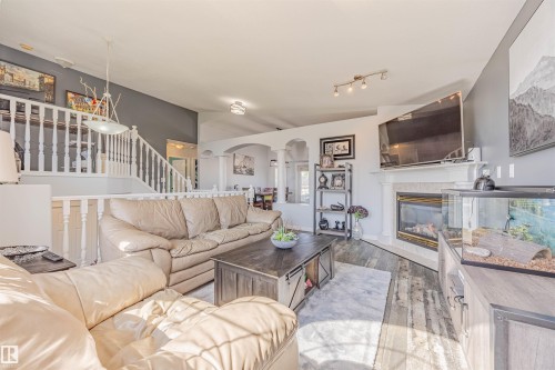 7808 163 Avenue, Edmonton, AB - Indoor Photo Showing Living Room With Fireplace