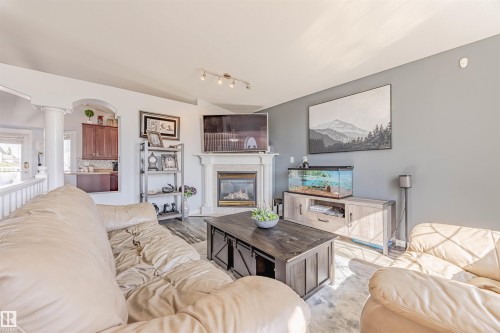 7808 163 Avenue, Edmonton, AB - Indoor Photo Showing Living Room With Fireplace