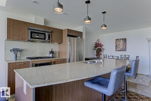 405 2510 109 Street Nw, Edmonton, AB - Indoor Photo Showing Kitchen With Stainless Steel Kitchen With Double Sink With Upgraded Kitchen