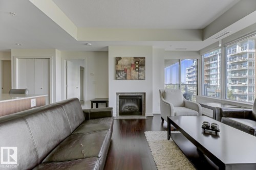 405 2510 109 Street Nw, Edmonton, AB - Indoor Photo Showing Living Room With Fireplace