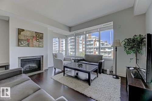 405 2510 109 Street Nw, Edmonton, AB - Indoor Photo Showing Living Room With Fireplace