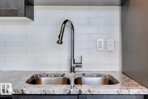 604 10238 103 Street, Edmonton, AB - Indoor Photo Showing Kitchen With Double Sink With Upgraded Kitchen