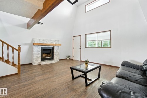 51019 Rge Road 273, Rural Parkland County, AB - Indoor Photo Showing Living Room With Fireplace