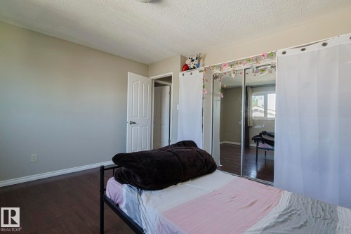 9308A & 9308B 109A Avenue, Edmonton, AB - Indoor Photo Showing Bedroom