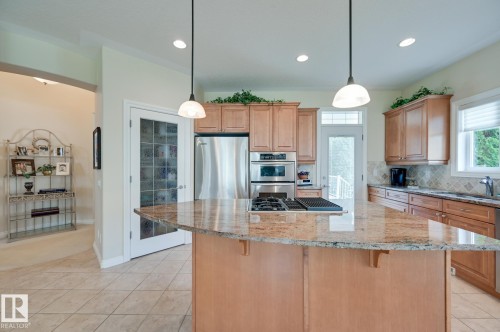 20 1225 Wanyandi Road, Edmonton, AB - Indoor Photo Showing Kitchen With Double Sink