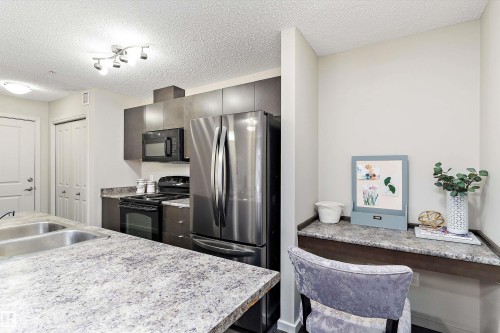 219 344 Windermere Road, Edmonton, AB - Indoor Photo Showing Kitchen With Double Sink
