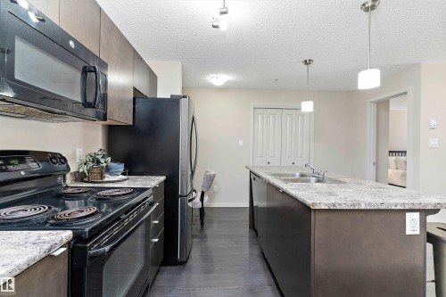 219 344 Windermere Road, Edmonton, AB - Indoor Photo Showing Kitchen With Double Sink