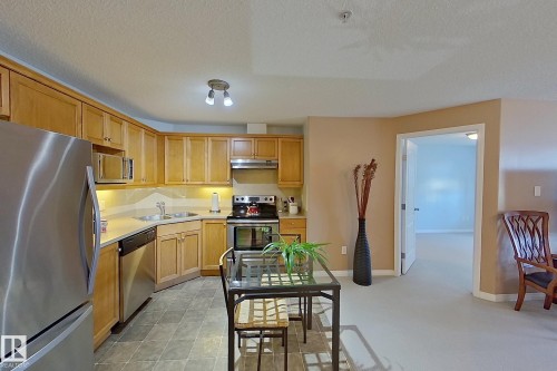 338 1520 Hammond Gate Gate, Edmonton, AB - Indoor Photo Showing Kitchen With Double Sink