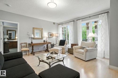 305 9819 96A Street, Edmonton, AB - Indoor Photo Showing Living Room