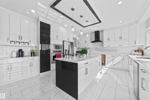 3909 49 Avenue, Beaumont, AB - Indoor Photo Showing Kitchen With Upgraded Kitchen