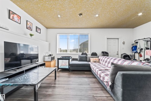 3909 49 Avenue, Beaumont, AB - Indoor Photo Showing Living Room