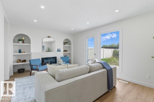 121 Abbottsfield Road, Edmonton, AB - Indoor Photo Showing Living Room With Fireplace