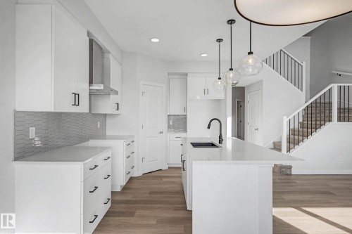 6923 51 Avenue, Beaumont, AB - Indoor Photo Showing Kitchen With Double Sink With Upgraded Kitchen