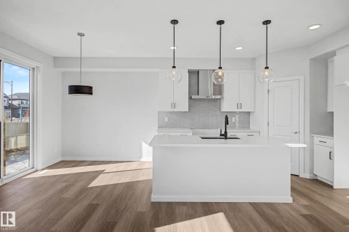 6923 51 Avenue, Beaumont, AB - Indoor Photo Showing Kitchen With Upgraded Kitchen