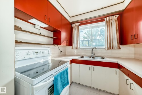 11233 95 Street, Edmonton, AB - Indoor Photo Showing Kitchen With Double Sink