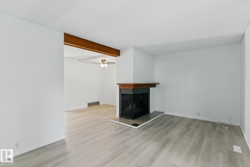 9 Grandin Woods Estates, St. Albert, AB - Indoor Photo Showing Other Room With Fireplace