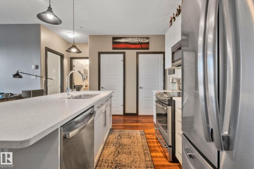 404 1144 Adamson Drive, Edmonton, AB - Indoor Photo Showing Kitchen With Stainless Steel Kitchen With Double Sink With Upgraded Kitchen