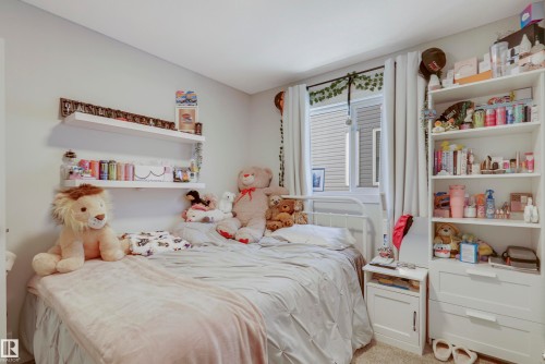 1138 Cy Becker Road, Edmonton, AB - Indoor Photo Showing Bedroom