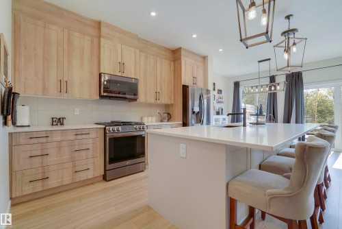1138 Cy Becker Road, Edmonton, AB - Indoor Photo Showing Kitchen With Upgraded Kitchen
