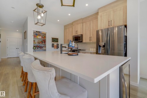 1138 Cy Becker Road, Edmonton, AB - Indoor Photo Showing Kitchen With Stainless Steel Kitchen
