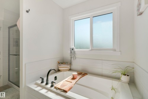 1138 Cy Becker Road, Edmonton, AB - Indoor Photo Showing Bathroom