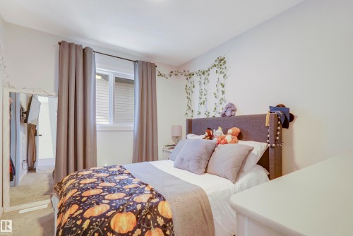 1138 Cy Becker Road, Edmonton, AB - Indoor Photo Showing Bedroom