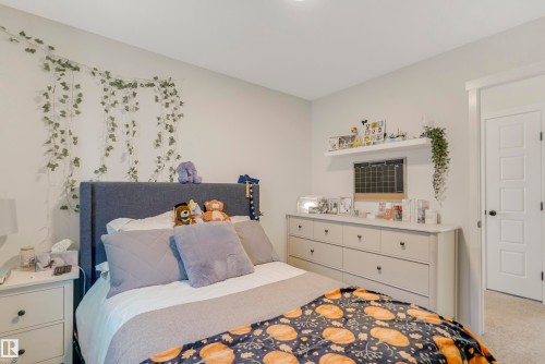 1138 Cy Becker Road, Edmonton, AB - Indoor Photo Showing Bedroom
