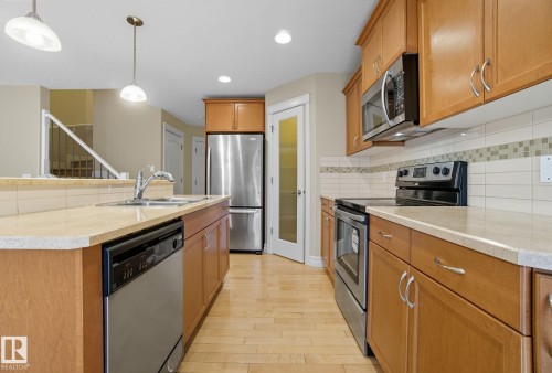 11611 17 Avenue, Edmonton, AB - Indoor Photo Showing Kitchen With Double Sink