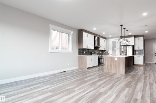17704 59 Street Nw, Edmonton, AB - Indoor Photo Showing Kitchen With Upgraded Kitchen