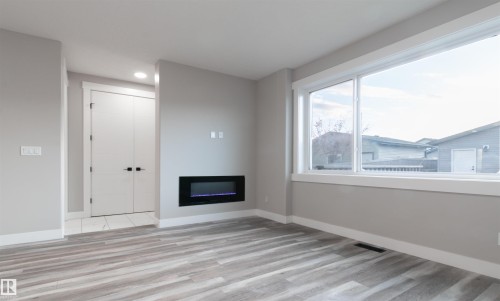 17704 59 Street Nw, Edmonton, AB - Indoor With Fireplace
