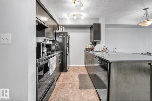 124 3315 James Mowatt Trail, Edmonton, AB - Indoor Photo Showing Kitchen