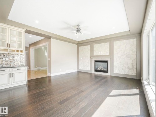 2421 Ashcraft Crescent, Edmonton, AB - Indoor Photo Showing Living Room With Fireplace
