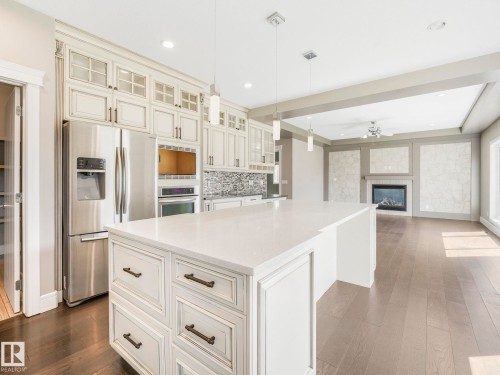 2421 Ashcraft Crescent, Edmonton, AB - Indoor Photo Showing Kitchen With Fireplace With Upgraded Kitchen