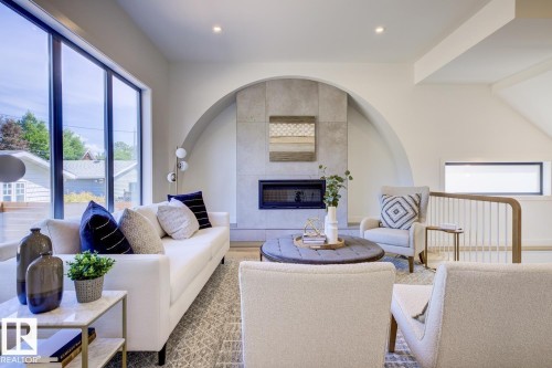 9346 72 Avenue, Edmonton, AB - Indoor Photo Showing Living Room With Fireplace