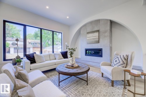 9346 72 Avenue, Edmonton, AB - Indoor Photo Showing Living Room With Fireplace