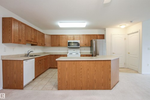 402 8912 156 Street, Edmonton, AB - Indoor Photo Showing Kitchen With Double Sink