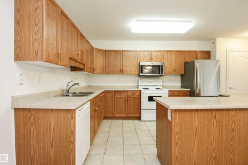 402 8912 156 Street, Edmonton, AB - Indoor Photo Showing Kitchen With Double Sink