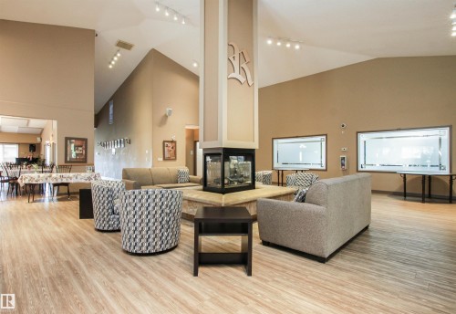 402 8912 156 Street, Edmonton, AB - Indoor Photo Showing Living Room With Fireplace