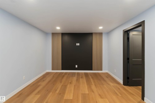 Unfurnished room featuring recessed lighting and light wood-type flooring - 6808 95 Avenue, Edmonton, AB - Indoor Photo Showing Other Room