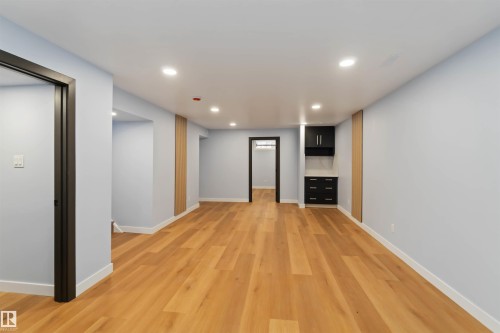 Finished basement featuring recessed lighting and light wood-style flooring - 6808 95 Avenue, Edmonton, AB - Indoor Photo Showing Other Room