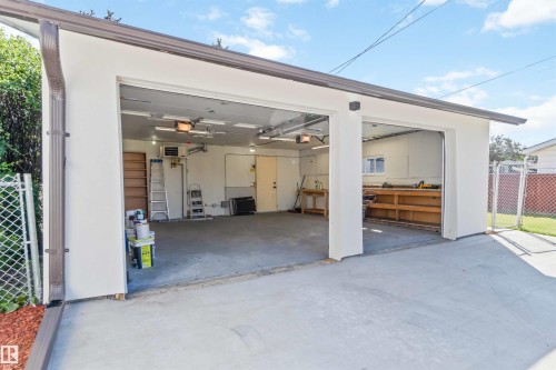 Garage featuring a heating unit - 6808 95 Avenue, Edmonton, AB - Outdoor With Exterior